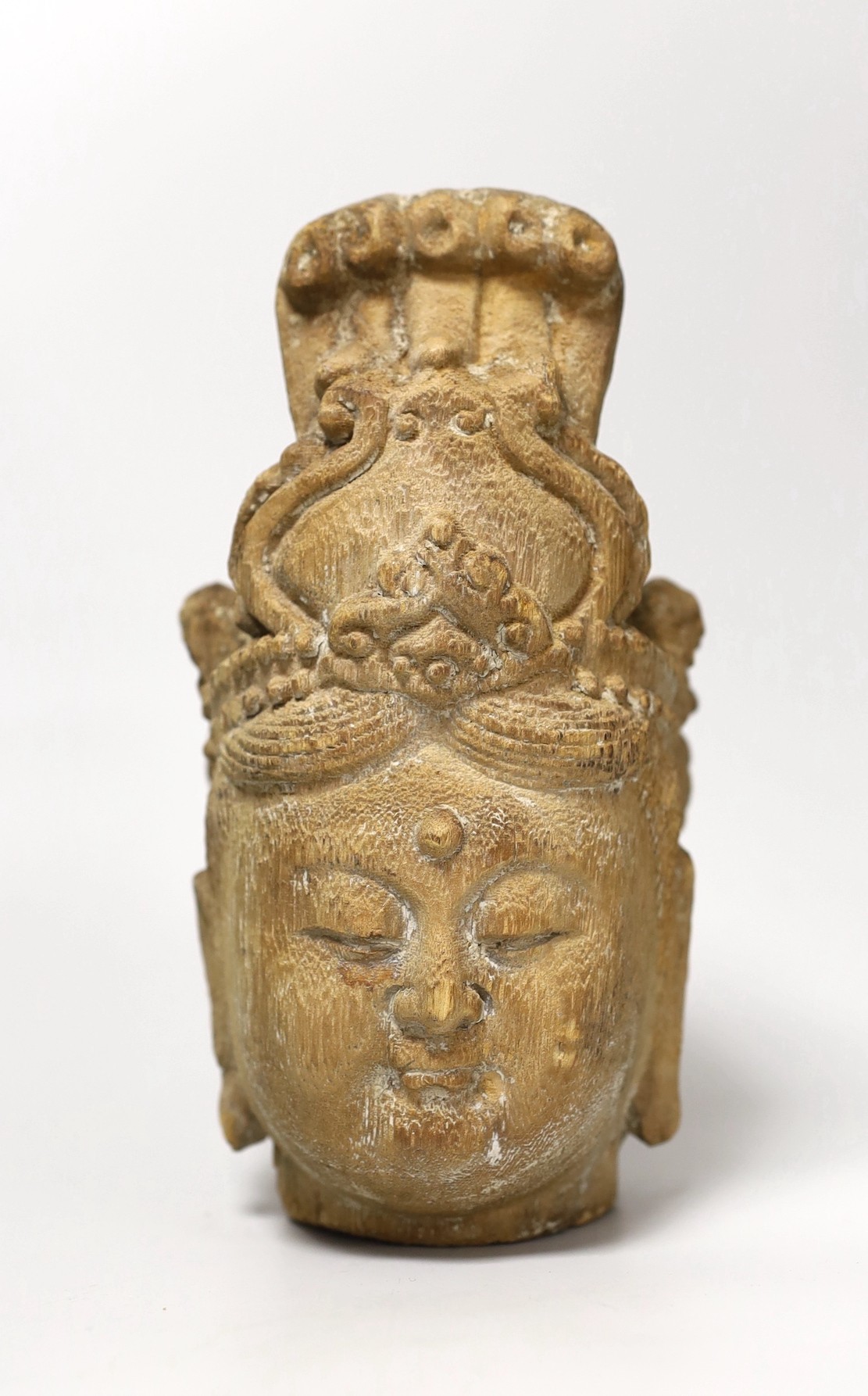 A Chinese Tang style wood head. 24cm high